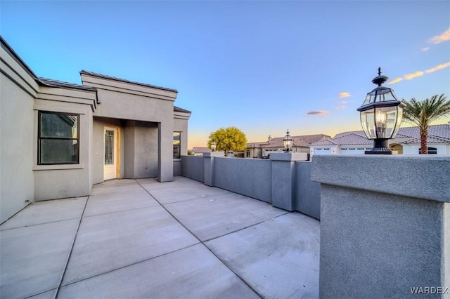 6068 S Greenhorn Dr, Fort Mohave, AZ 86426 - patio terrace at dusk with a patio area