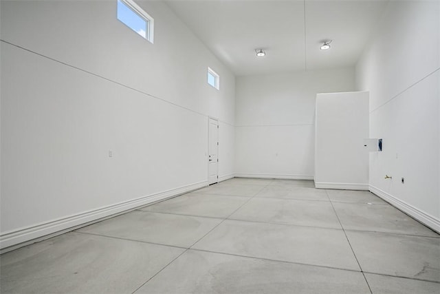 6068 S Greenhorn Dr, Fort Mohave, AZ 86426 - empty room featuring finished concrete flooring and baseboards