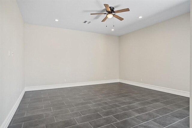 6068 S Greenhorn Dr, Fort Mohave, AZ 86426 - empty room with a ceiling fan, recessed lighting, and baseboards