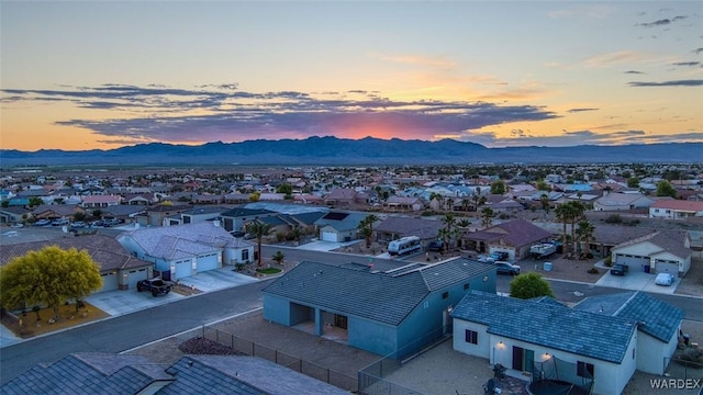 6068 S Greenhorn Dr, Fort Mohave, AZ 86426 - aerial perspective of suburban area with a mountainous background