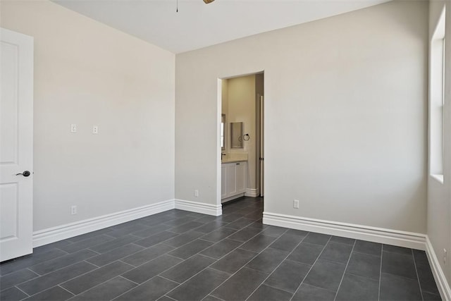 6068 S Greenhorn Dr, Fort Mohave, AZ 86426 - empty room featuring ceiling fan and baseboards