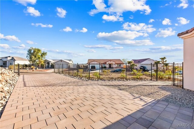 exterior space with a residential view and fence