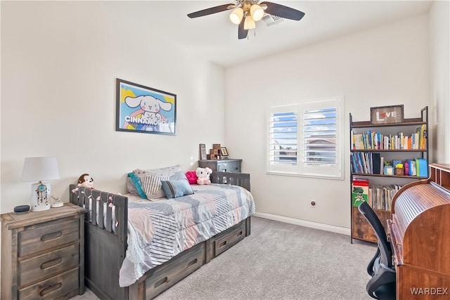 bedroom featuring baseboards, ceiling fan, and light colored carpet