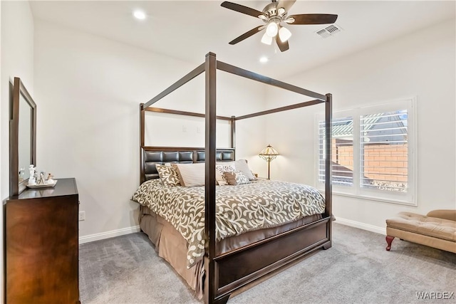 bedroom with carpet, visible vents, and baseboards