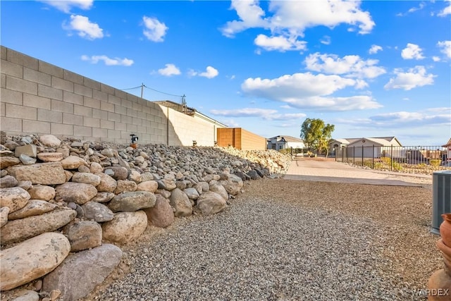 view of yard featuring fence