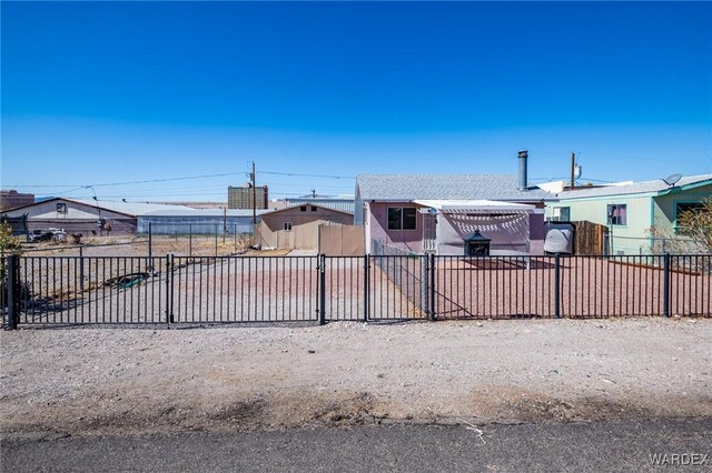 exterior space featuring a gate and fence