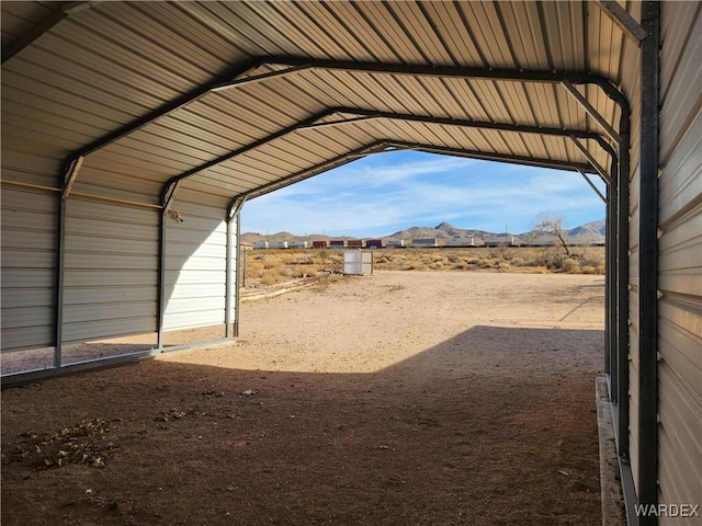 view of yard with a detached carport