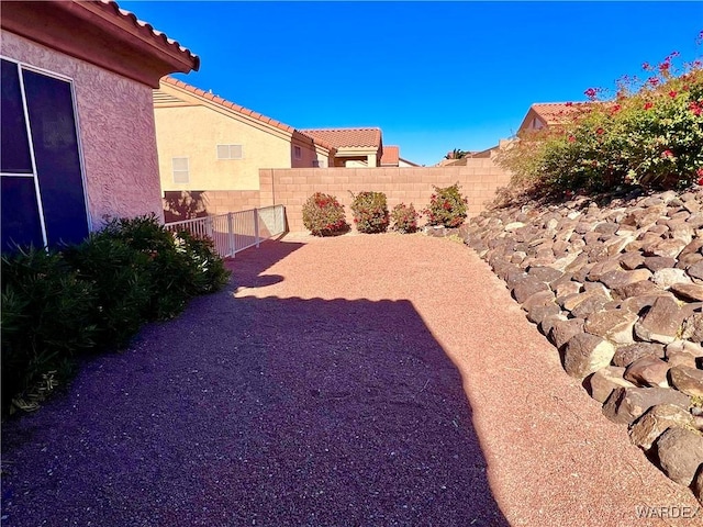 view of yard with a patio area and a fenced backyard