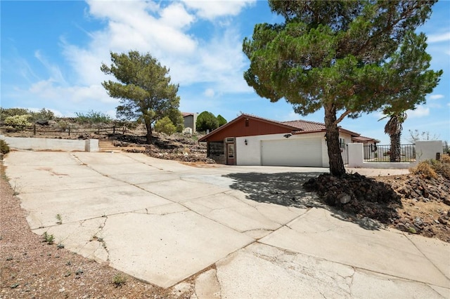 898 Crestwood Ln, Kingman, AZ 86409 - view of property exterior featuring driveway and a garage