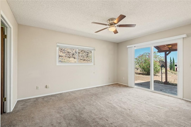 898 Crestwood Ln, Kingman, AZ 86409 - spare room with carpet floors, a ceiling fan, and a textured ceiling