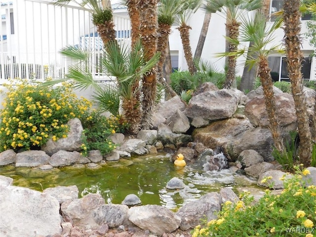 1800 Club House Way Unit D45, Bullhead City, AZ 86442 - view of yard with a small pond