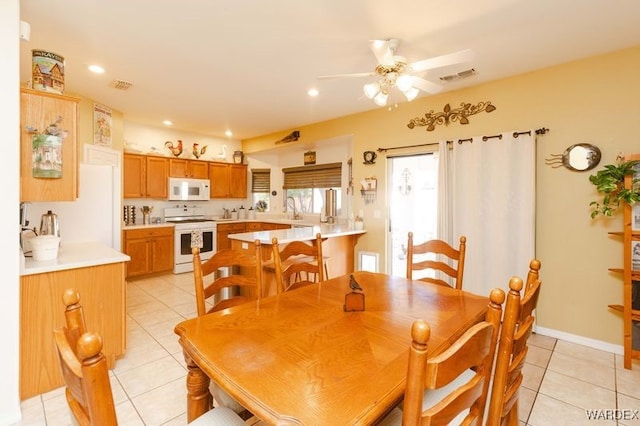 dining space with recessed lighting, visible vents, baseboards, and light tile patterned floors