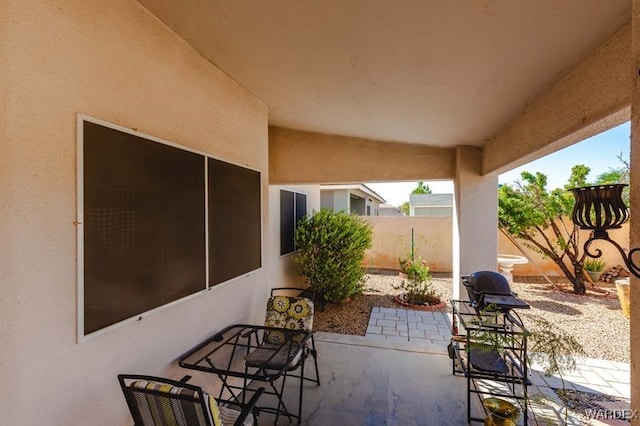 view of patio with fence