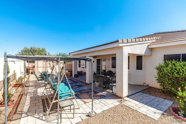 view of patio / terrace with a pergola