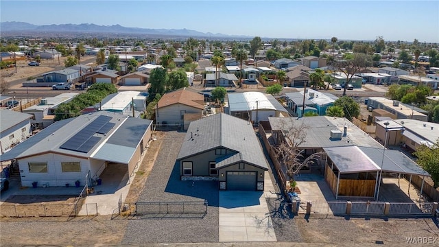 bird's eye view with a residential view and a mountain view