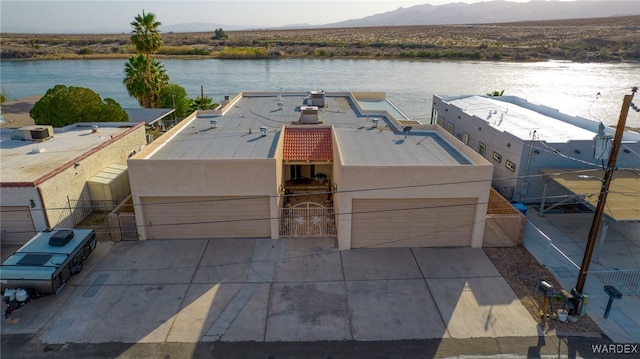 aerial view with a water and mountain view