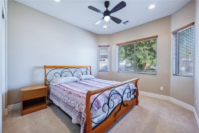 10726 S Shimmering Way, Mohave Valley, AZ 86440 - carpeted bedroom with recessed lighting and ceiling fan