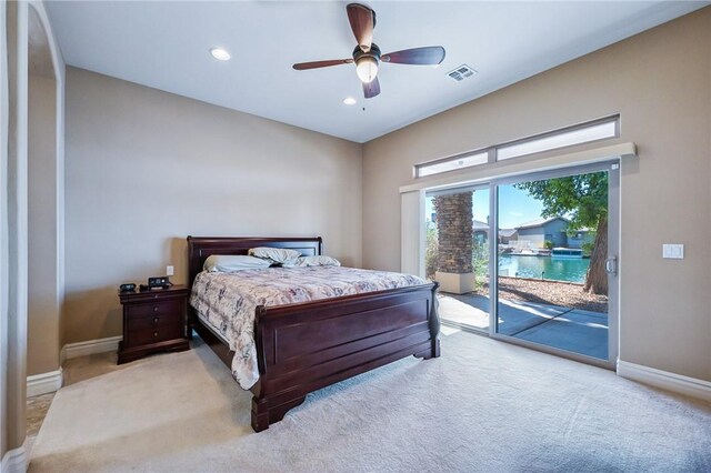 10726 S Shimmering Way, Mohave Valley, AZ 86440 - carpeted bedroom with access to outside, recessed lighting, and ceiling fan