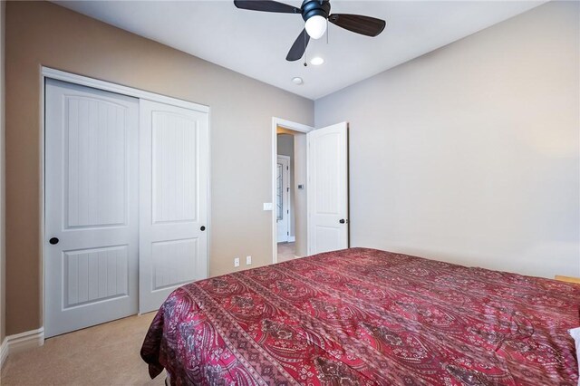 10726 S Shimmering Way, Mohave Valley, AZ 86440 - bedroom featuring light colored carpet, a closet, recessed lighting, and a ceiling fan