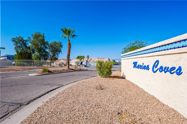 10726 S Shimmering Way, Mohave Valley, AZ 86440 - view of asphalt road featuring a residential view and curbs