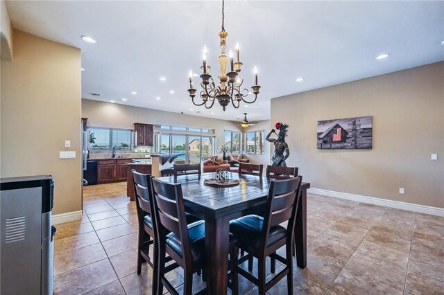 10726 S Shimmering Way, Mohave Valley, AZ 86440 - dining area with a chandelier, recessed lighting, and light tile patterned floors