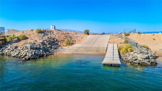 10726 S Shimmering Way, Mohave Valley, AZ 86440 - water view featuring a boat ramp and a floating dock