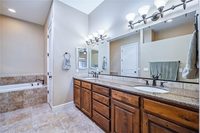 10726 S Shimmering Way, Mohave Valley, AZ 86440 - bathroom with double vanity and a garden tub
