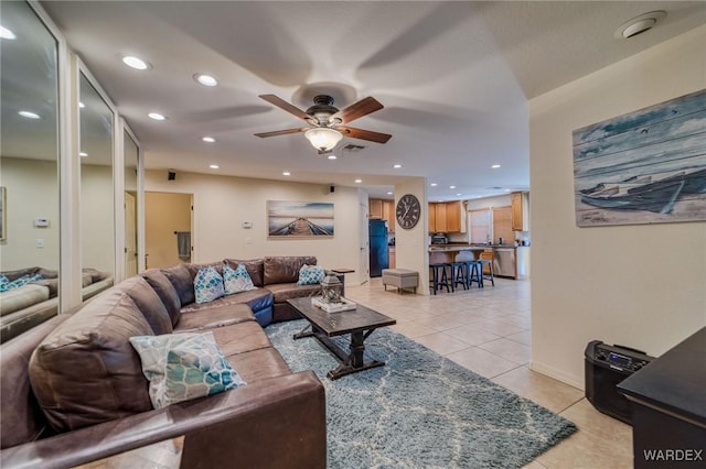 living room with recessed lighting, ceiling fan, and light tile patterned floors