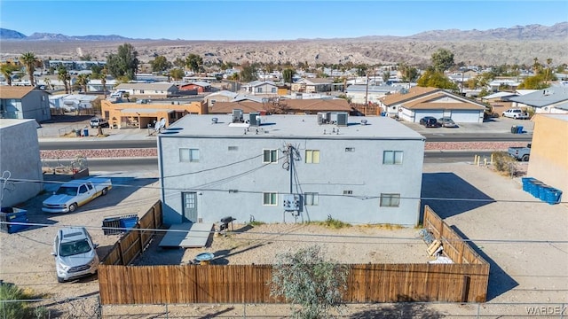 bird's eye view featuring a residential view and a mountain view