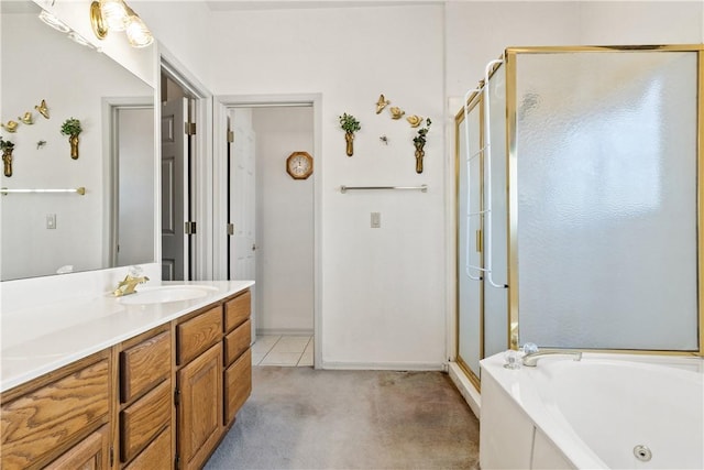 3628 N Venus Ct, Golden Valley, AZ 86413 - bathroom with a shower stall, vanity, a jetted tub, and baseboards