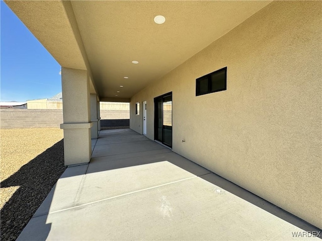 view of patio with fence