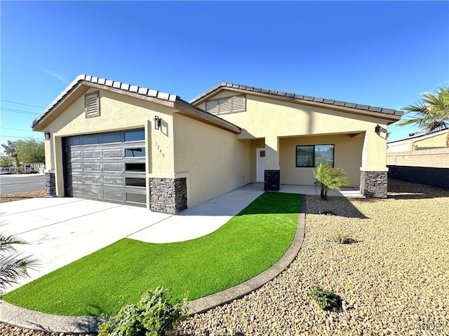 ranch-style home featuring stone siding, concrete driveway, an attached garage, and stucco siding