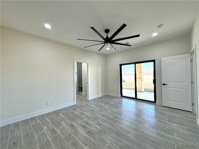 spare room featuring a ceiling fan, recessed lighting, light wood-style flooring, and baseboards