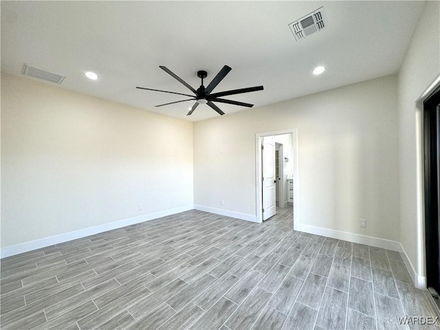 empty room featuring ceiling fan, light wood-style flooring, visible vents, and recessed lighting