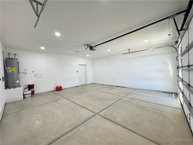 garage with recessed lighting, baseboards, a garage door opener, and electric water heater