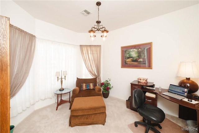 office area featuring light carpet, visible vents, and an inviting chandelier