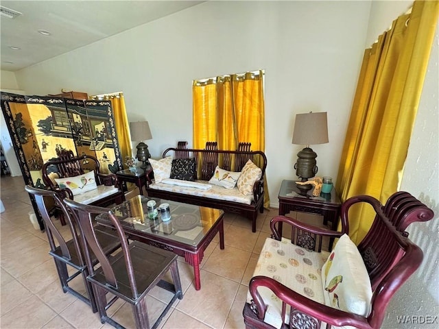 tiled living area with visible vents