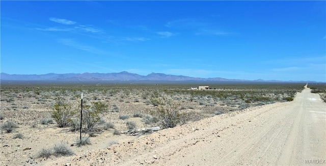 property view of mountains featuring a rural view and a desert view