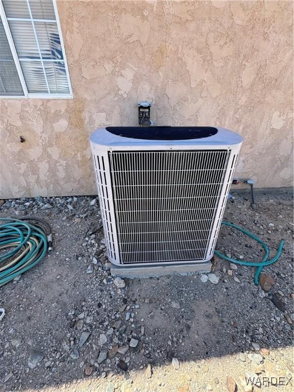 exterior details featuring cooling unit