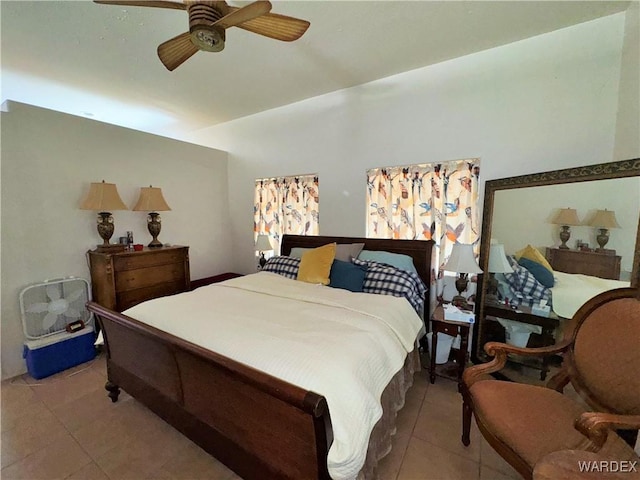 bedroom with light tile patterned floors and ceiling fan