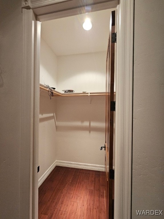 spacious closet with wood finished floors