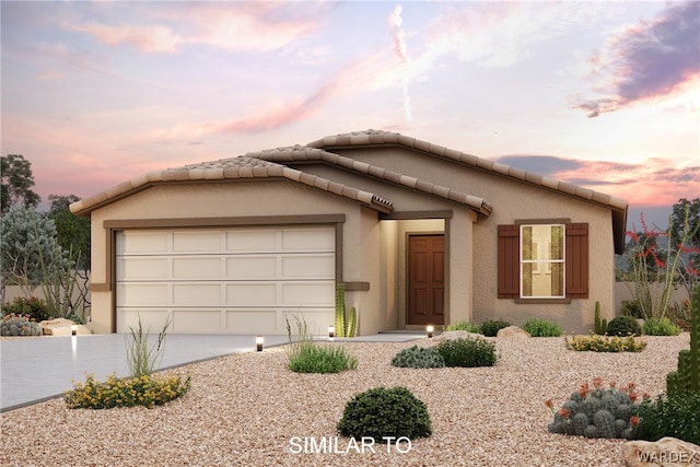 ranch-style house featuring an attached garage, driveway, a tiled roof, and stucco siding