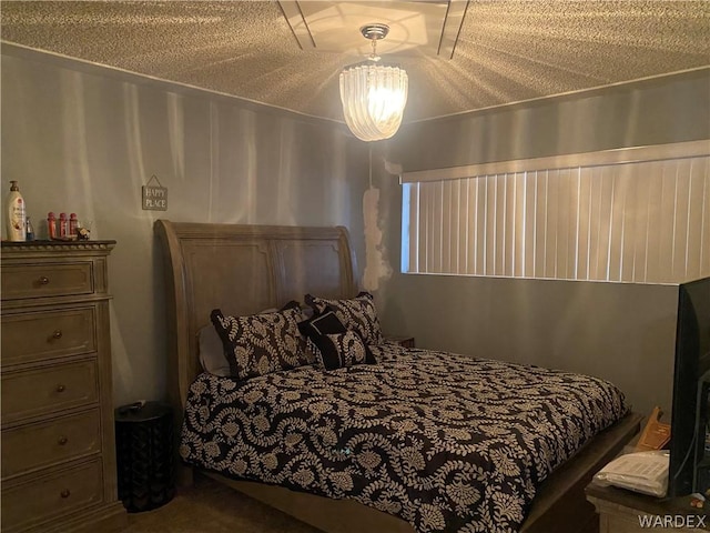 bedroom featuring a textured ceiling