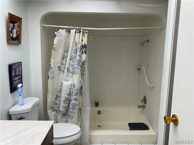 full bath featuring curtained shower, vanity, and toilet