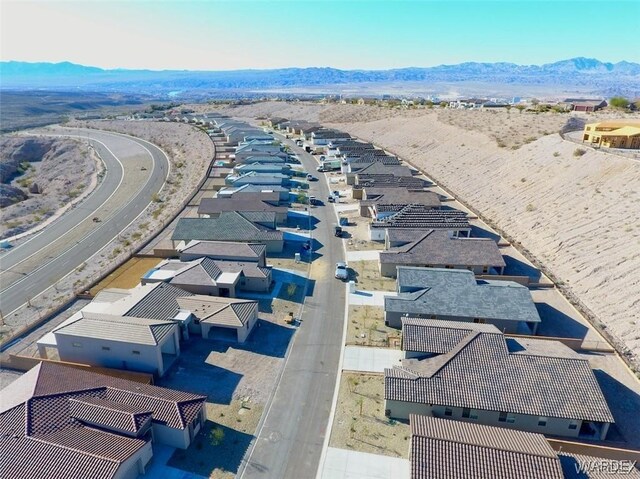 drone / aerial view with a mountain view and a residential view