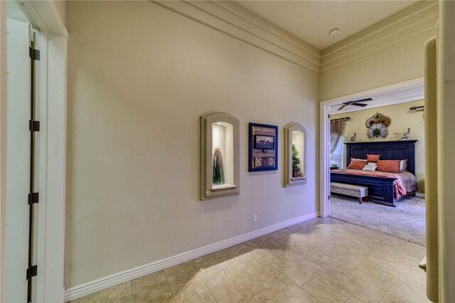 25 Torrey Pines Dr, Mohave Valley, AZ 86440 - hallway featuring baseboards and a towering ceiling