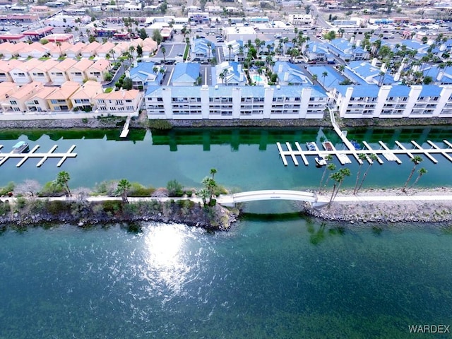 bird's eye view featuring a water view and a residential view