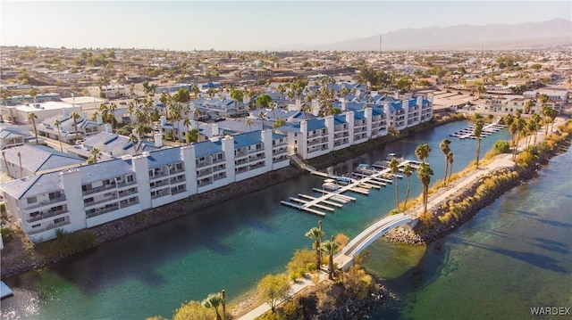 bird's eye view featuring a residential view and a water view