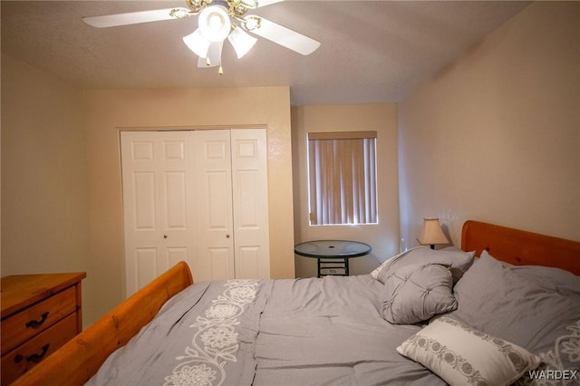 bedroom with a closet and a ceiling fan