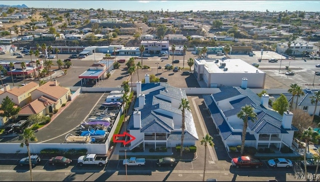 birds eye view of property with a residential view